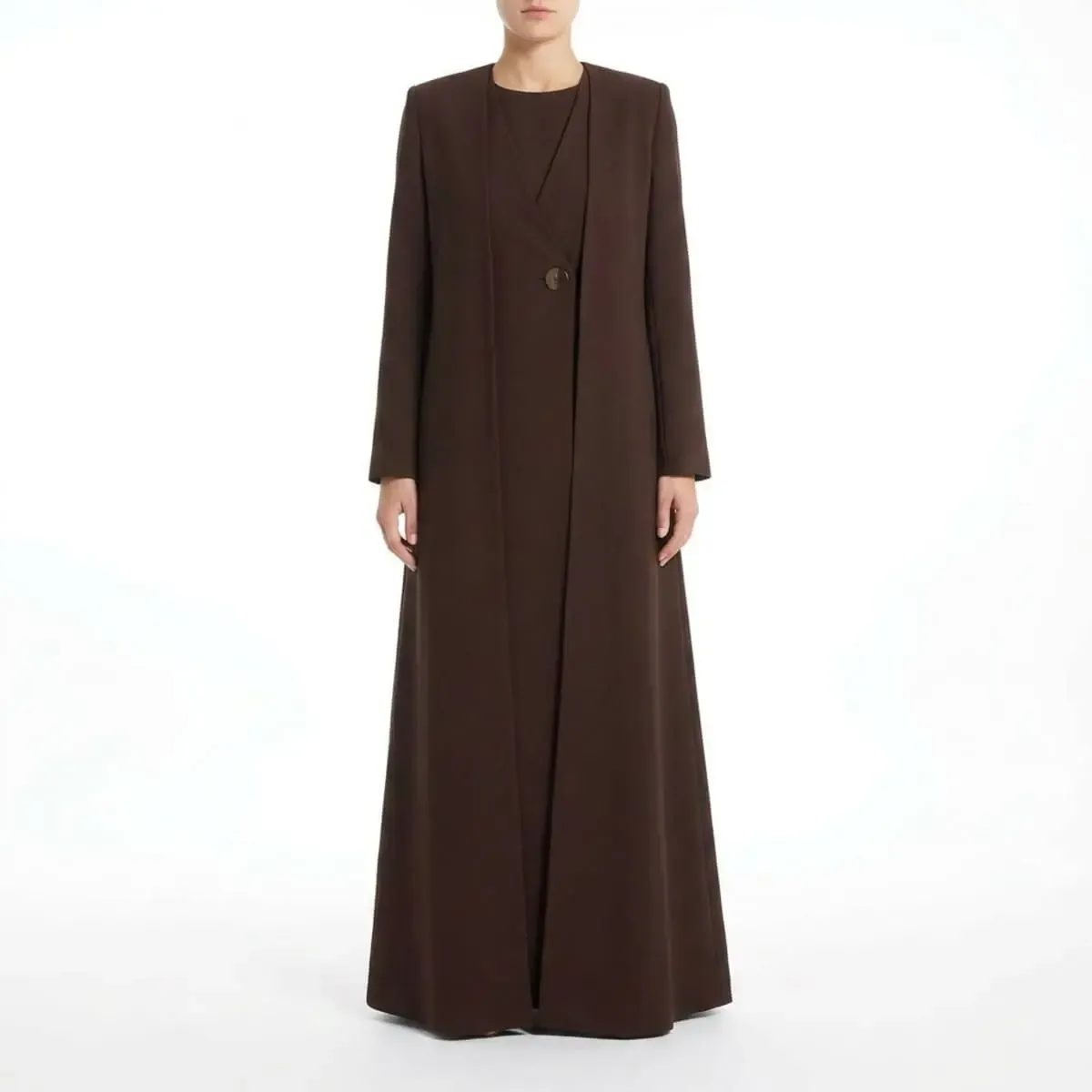 Luxury espresso brown tailored abaya featuring a wrap-front silhouette, single tonal button closure, premium crepe fabric, and minimalist architectural design by LAYL.